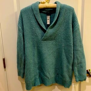 Shaker style top . “Blue frosting” light greenish blue. . Nylon, wool ,acrylic.